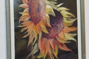 Foto eines Bildes mit zwei Sonnenblumen.